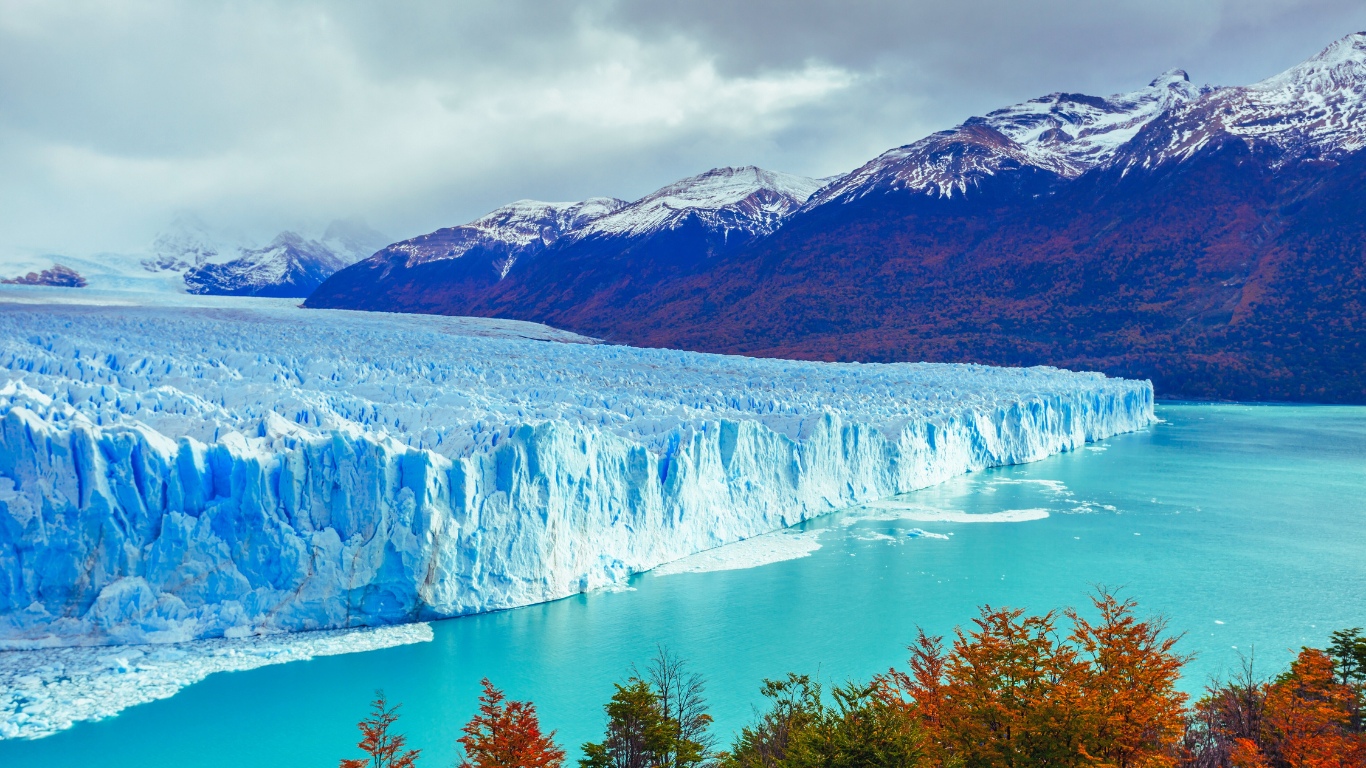 Perito Moreno Glacier in El Calafate, Argentina - A massive blue glacier wall rising from turquoise waters, showcasing Patagonia's natural beauty for corporate incentive travel